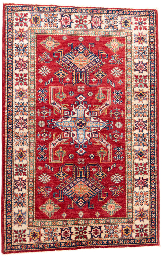 Red Kazak Carpet with Blue, Cream & Green Borders